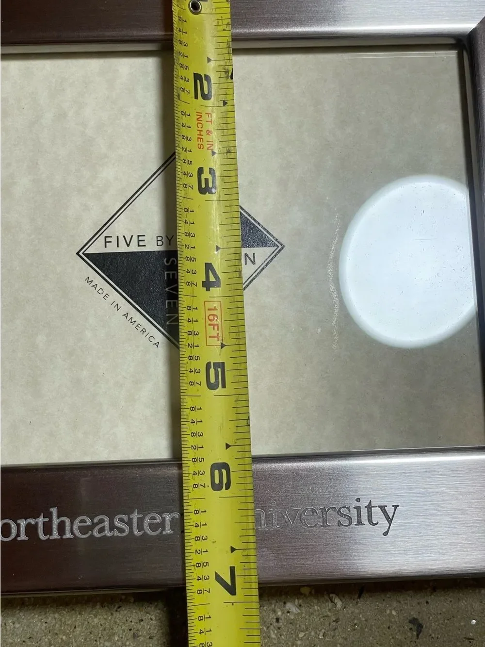 Northeastern University holds 5”x7”